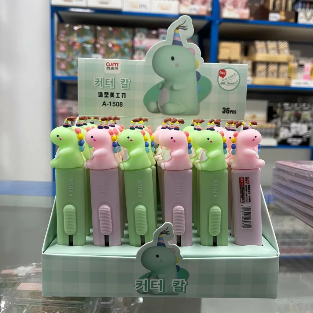 Corta Cartón de Dinosaurio Cutter pvc y metálico